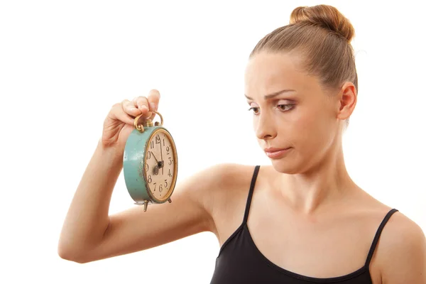 Woman with alarm clock, isolated on white — Stock Photo, Image