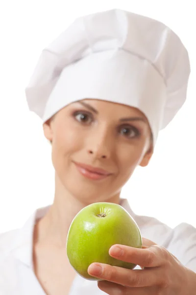 Smiling woman cook with green apple — Stock Photo, Image