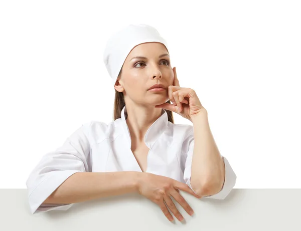 Doctor showing billboard sign with copy space — Stock Photo, Image