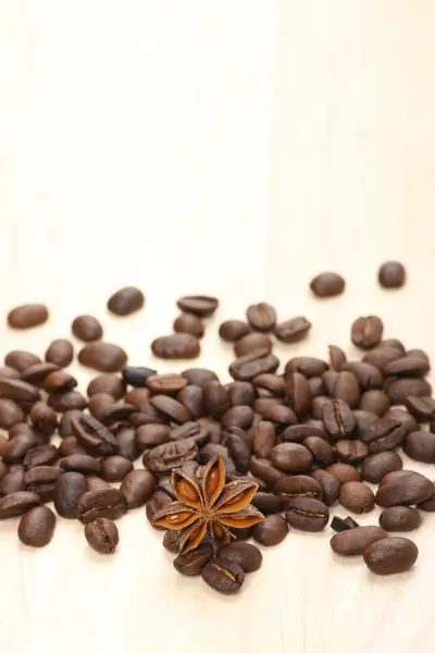 Coffee beans on the table — Stock Photo, Image