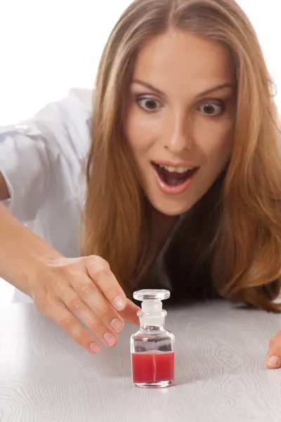 Woman doctor or nurse with medication in bottle — Stock Photo, Image