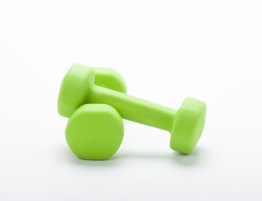 Beyaz arka planda izole küçük yeşil halter