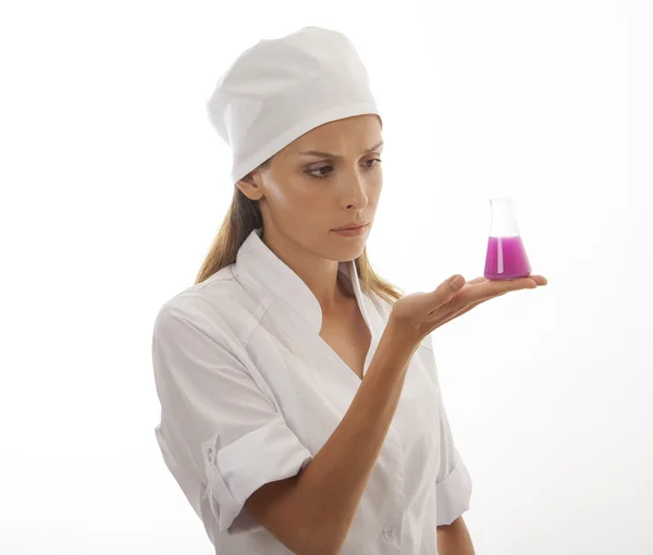 Woman chemist and chemicals in flasks — Stock Photo, Image