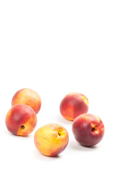 Ripe peaches fruits isolated on white — Stock Photo, Image