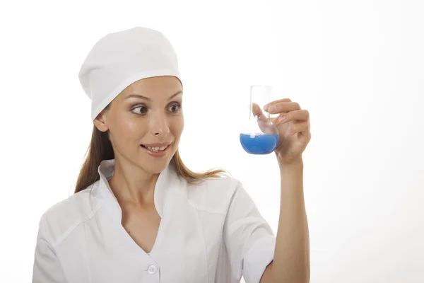Woman chemist and chemicals in flasks — Stock Photo, Image