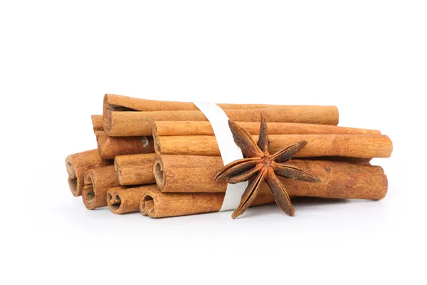 Cinnamon and star anise, isolated on white — Stock Photo, Image