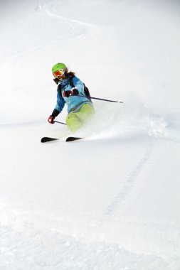 Skier in deep powder, extreme freeride clipart
