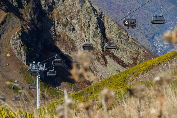 Chairlift in mountains of Krasnaya Polyana — Stock Photo, Image