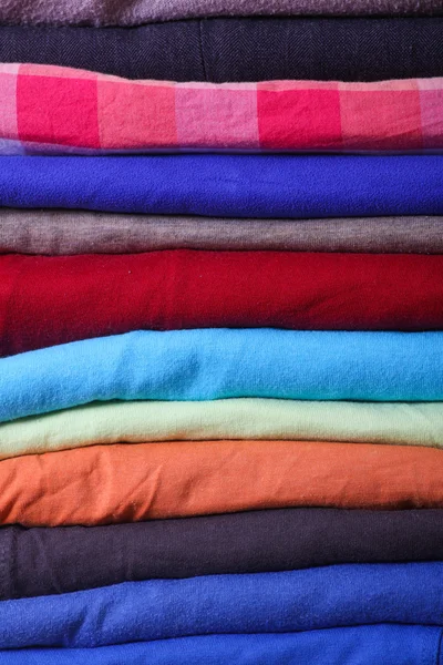 Pile of colorful clothes — Stock Photo, Image