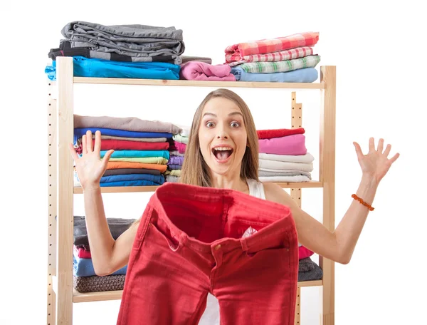 Young woman standing near the wardrobe — Stock Photo, Image