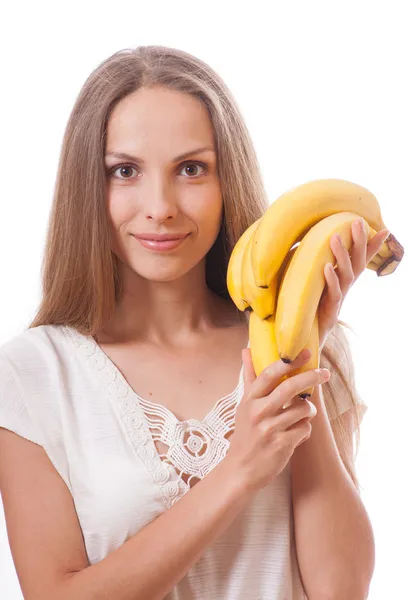 Young girl holding banana — Stock Photo, Image