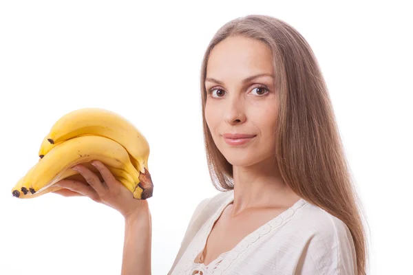 Joven chica sosteniendo plátano — Foto de Stock