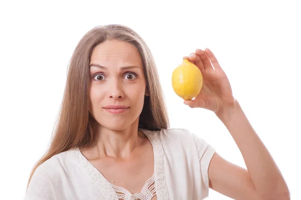 Young woman holding a lemon — Stock Photo, Image