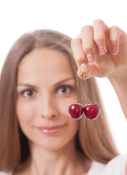 Hand holding two fresh cherries — Stock Photo, Image