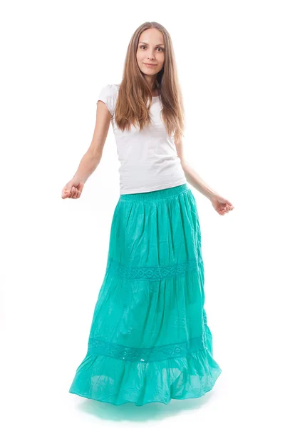 Young woman in a long green skirt — Stock Photo, Image