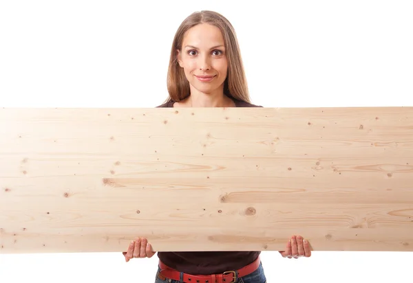 Vrouw achter een houten plank — Stockfoto