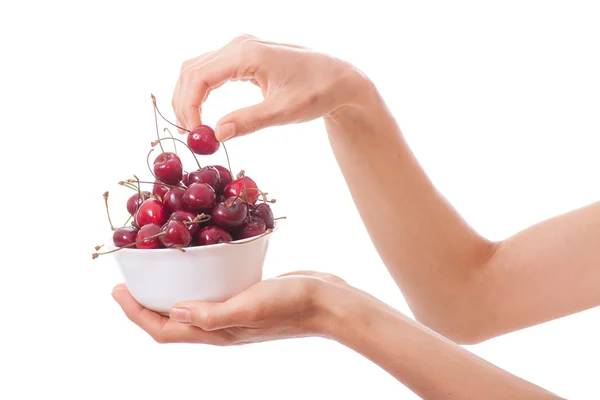 Bowl of cherries in womens hands — Stock Photo, Image