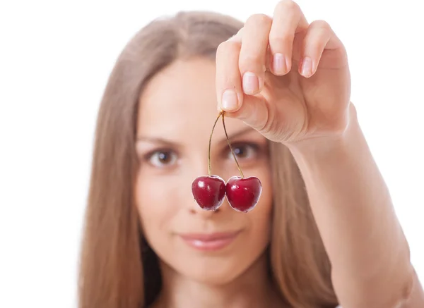 Hand holding two fresh cherries — Stock Photo, Image