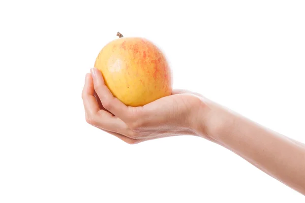 Pomme dans une main féminine — Photo