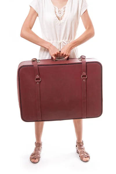 Vintage suitcase in female hands — Stock Photo, Image