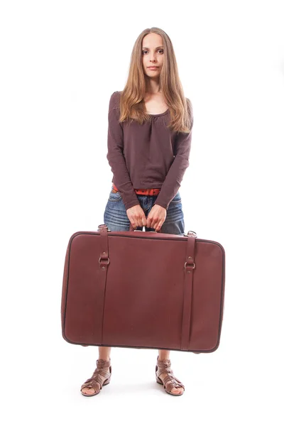 Girl standing with suitcase. Isolated on white — Stock Photo, Image