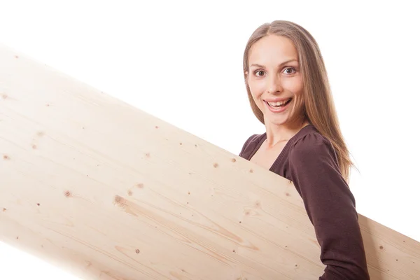 Mujer detrás de una tabla de madera —  Fotos de Stock