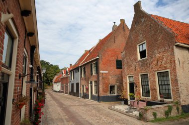 Traditional historic medieval houses in the old picturesque fortified town of Elburg, Gelderland, Netherlands