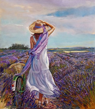 Young woman in dress with bicycle in lavender field 