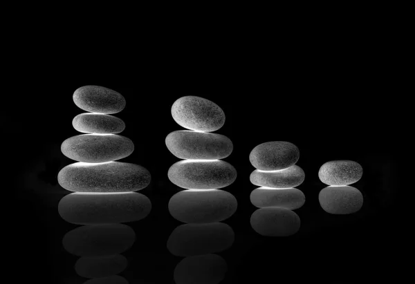 SPA PEBBLES in stacks, inverted, colored — Stock Photo, Image