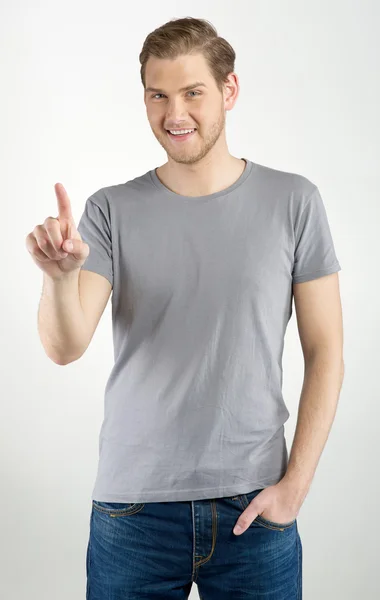 Man touching an imaginary button — Stock Photo, Image