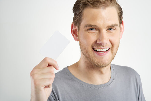 man holding card