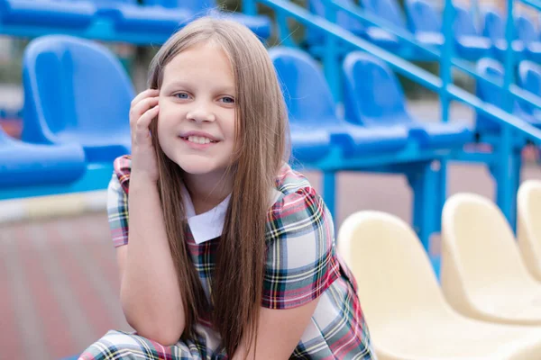 Stadium Tribune Tweet Brunette Girl Dress Tribunes Plastic Colorful Chairs —  Fotos de Stock