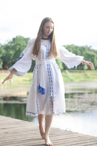 Girl Embroidered Ukrainian Shirt Sits Pier Reflection Clouds Water Lake — 스톡 사진