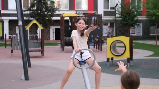 Kids Outdoors Having Fun Modern Playground New Colorful Equipment Sisterhood — Video Stock