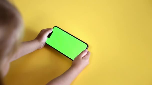 Preschool Girl Use Smartphone Green Screen Layout Chroma Key Mock — Stockvideo