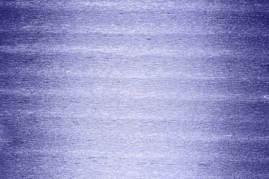 Katlanmış parlak metalik krep kağıdı ya da folyonun dokusu, 2022 yılının renginde. Kopyalama alanı olan soyut arkaplan. Karanlık taraflardan açık merkeze doğru bir değişim. Yatay yönelim.