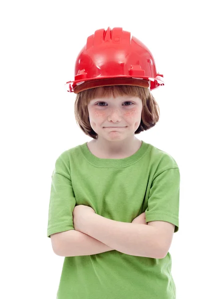 Giovane ragazzo con hardhat rosso — Foto Stock