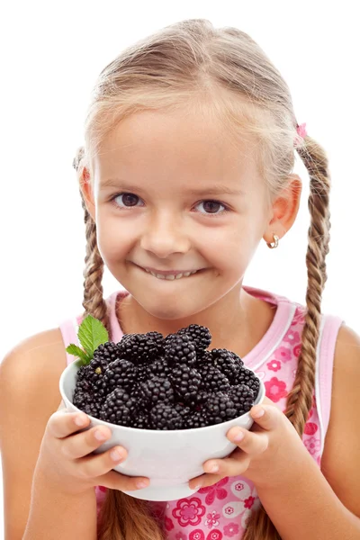 Yummy blackberries - happy healthy girl with fresh fruits — Stock Photo, Image
