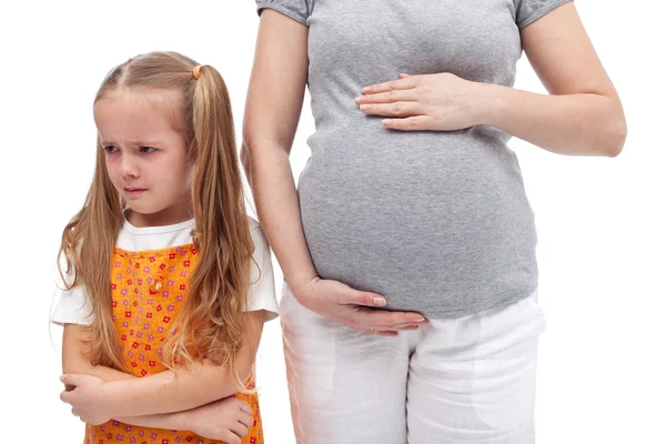 Young girl not happy about her new sibling — Stock Photo, Image