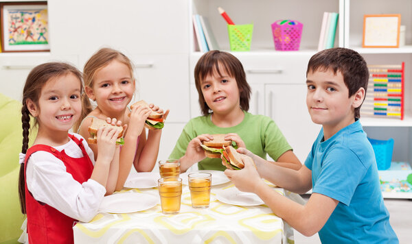 Kids having a snack in their room