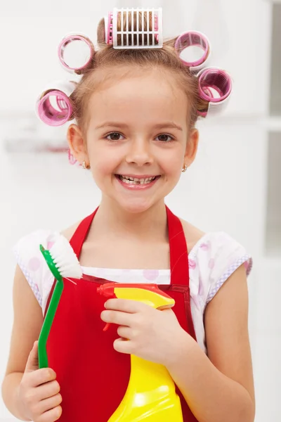 Little girl with cleaning utensils — Stock Photo, Image
