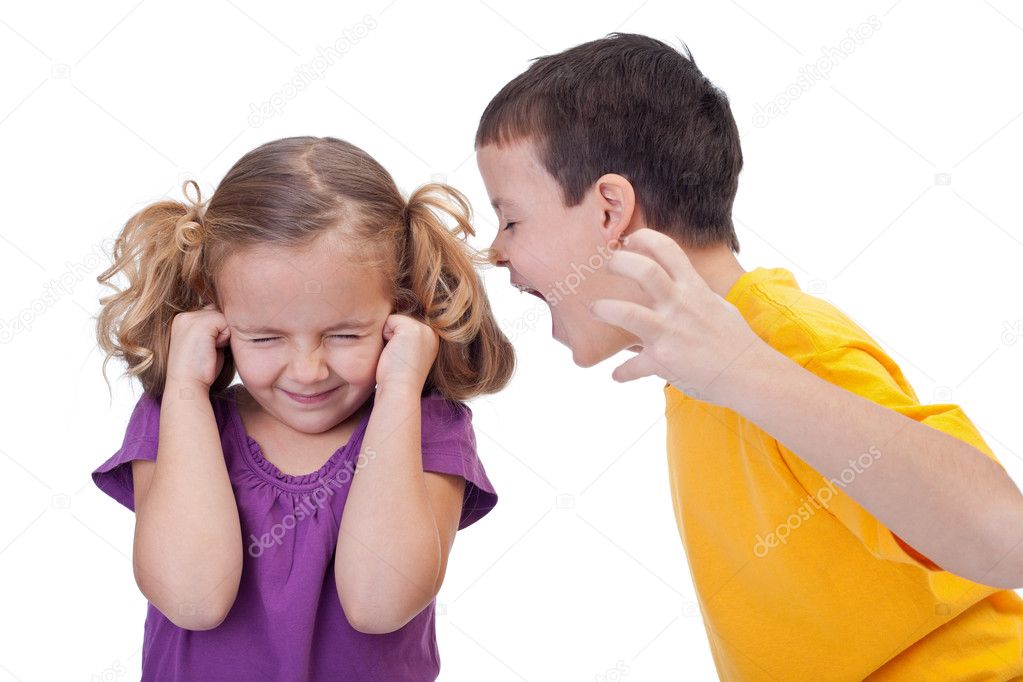 Quarreling kids - boy shouting to girl