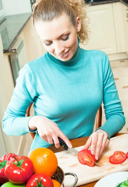 Cheerful young woman cooking — Stock Photo, Image