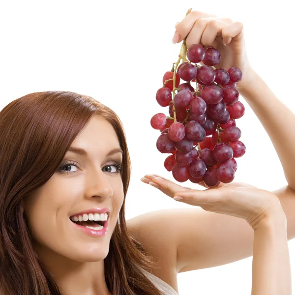 Mujer alegre con uva, sobre blanco — Foto de Stock