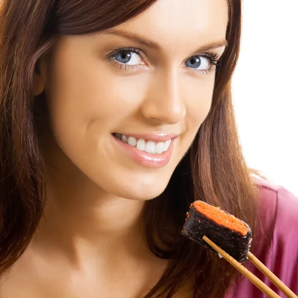 Hermosa mujer comiendo sushi roll, sobre blanco — Foto de Stock