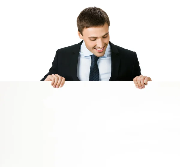 Επιχειρηματίας που δείχνει η πινακίδα, σε λευκό — Φωτογραφία Αρχείου
