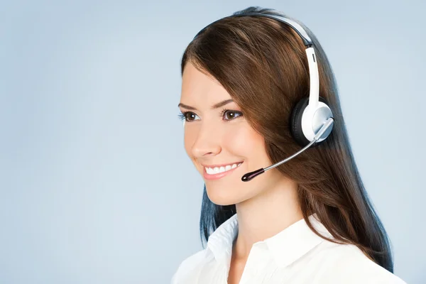 Support telefoon operator in hoofdtelefoon, op blauw — Stockfoto