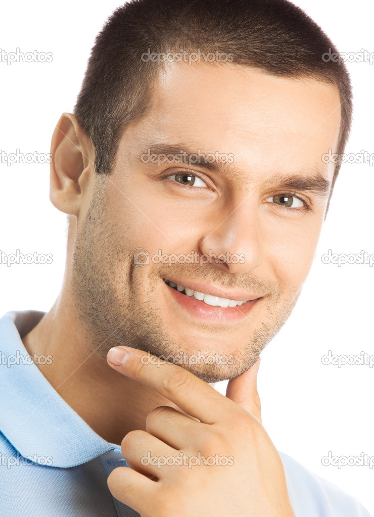 Cheerful thinking young man, over white