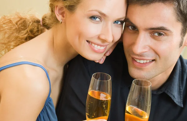 Cheerful couple with champagne — Stock Photo, Image