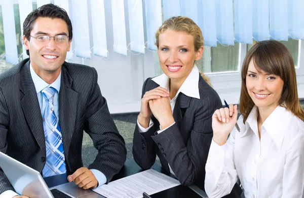 Portrait of three businesspeople at office Stock Photo